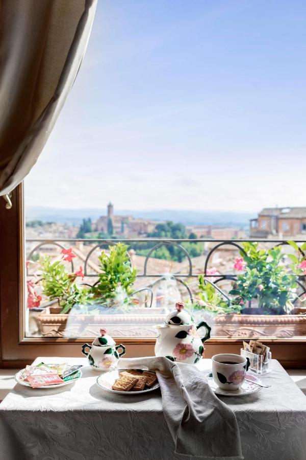 Residenza D'Epoca Palazzo Borghesi Acomodação com café da manhã Siena Exterior foto